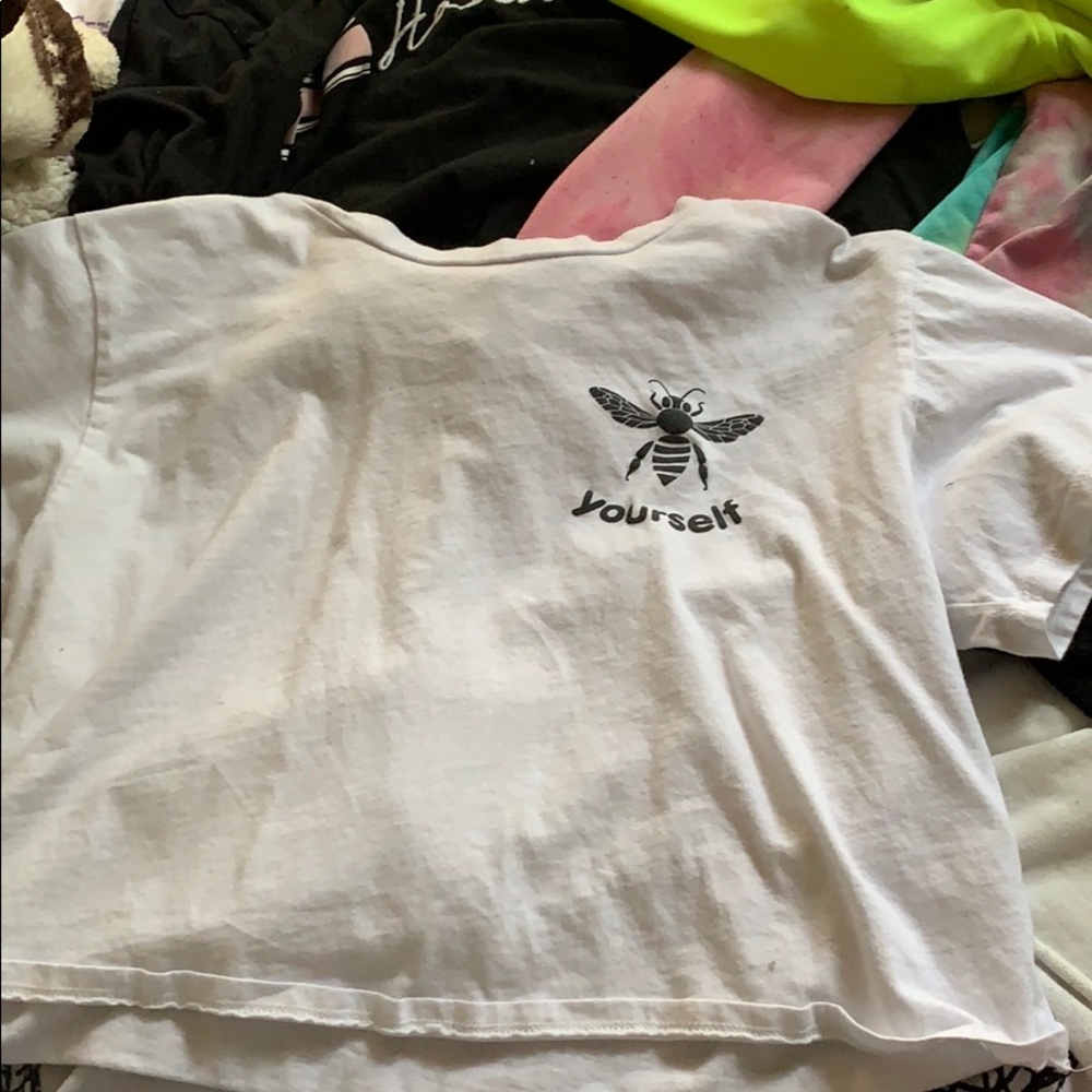 White shit that says bee yourself
